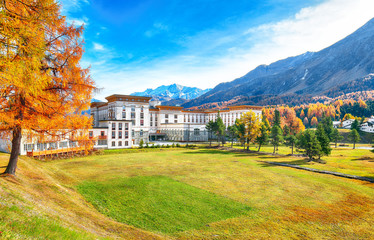 Awesome autumn scene in Swiss Alps and Maloja Palace.