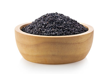 sesame in wood bowl on white background