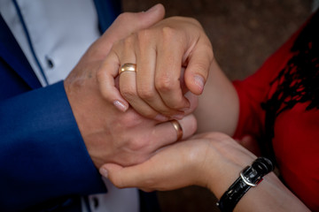 Loving couple holding hands