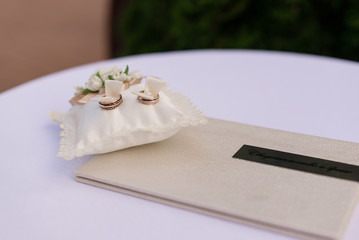 wedding rings and marriage certificate