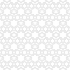 Vector geometric ornamental seamless pattern. Subtle texture with stars, floral shapes, grid, mesh, weave. Abstract background in white and light gray colors. Delicate repeat design for decor, prints