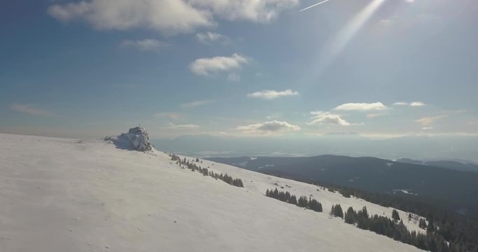Aerial Drone View Of Snowy Austrian Alps On Sunny Day