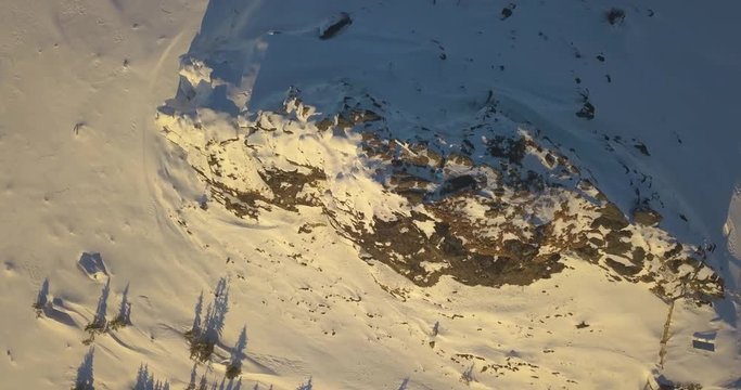 Aerial Drone View Of Snowy Austrian Alps On Sunny Day