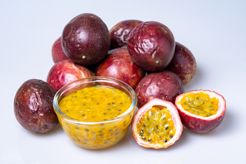 close up of fresh purple passion fruits harvest from farm , isolate on white background
