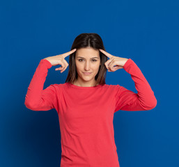 Fototapeta premium Brunette young woman wearing a red T-shirt