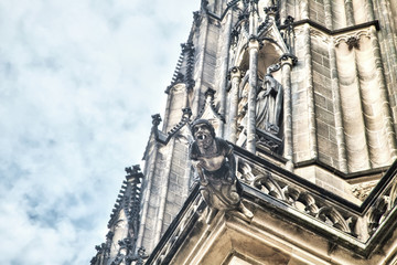 Fototapeta na wymiar The decoration of a medieval Gothic temple, architectural elements of the facade