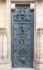 Old iron door - entrance to the medieval Gothic cathedral