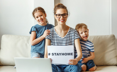 Cheerful mother with kids asking stay at home