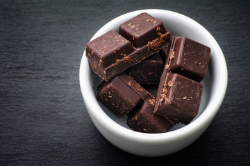 Homemade dark chocolate in a bowl