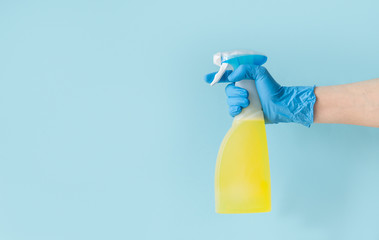 Coronavirus concept - hand holding sanitizer, copy space