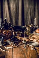 still life with food on a rustic wooden table