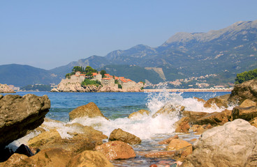 Fototapeta premium Sveti Stefan island and waves of sea, Montenegro
