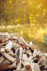 Village life. A pile of chopped firewood