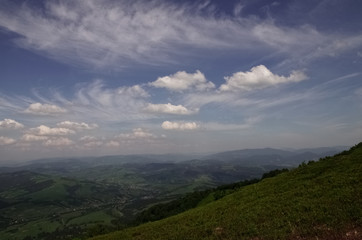 Fototapeta premium Mountains and sky with clouds above the peaks. Mountain beautiful landscape. 