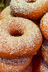 Stack of sugared doughnuts, Clapham Common, London, UK