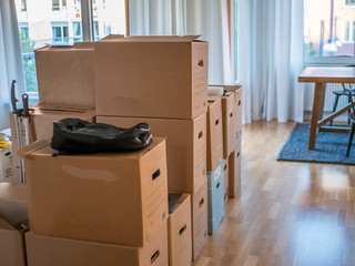 Moving boxes and storage boxes in different sizes at home prepered for move.