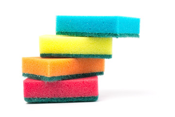 Colored sponges for washing dishes and other domestic needs, isoleted on white background