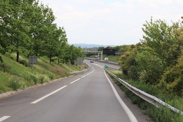 Fototapeta na wymiar Sortie de voie rapide - sortie de la D301 ou boulevard urbain sud à Corbas - Ville de Corbas - Département du Rhône - France