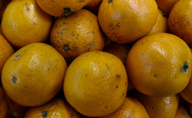 Mandarin oranges in a basket.