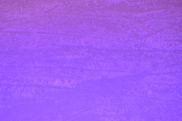 High angle of ice rink ice lit with purple and blue lights, London, UK