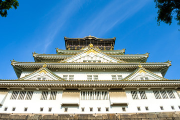 Osaka castle at sunset on a clear day