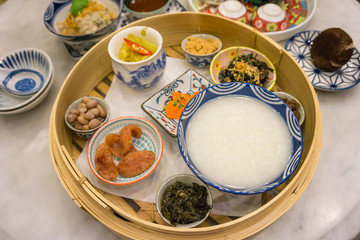Chinese rice porridge breakfast set in restaurant, Thailand