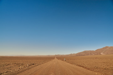 Fototapeta na wymiar Road to the Hidden Lagoons of Baltinache. San Pedro de Atacama, Antofagasta - Chile. Desert. Andes Range & Route B241..