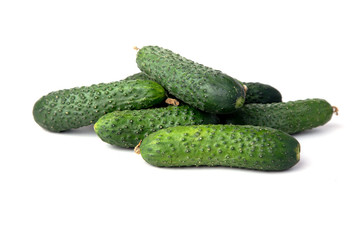 Cucumber and cucumber slices isolated on a white background