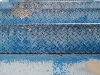 Painted steel surface and peeling iron surface