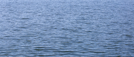 Obraz premium texture of blue sea water surface background