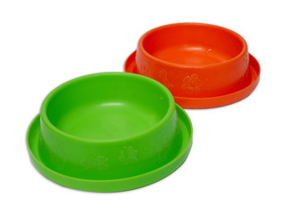 green and orange color pet feeding bowl isolated on whith background with clipping path