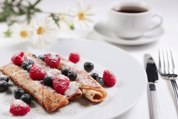 .Pancakes on a white background. Cooking. Healthy fresh food. Organic fruits. Menu background. Pancakes with cottage cheese.