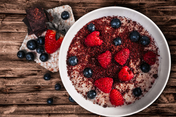 Oatmeal with berries. Vegetarian healthy food. Healthy fresh nutrition.