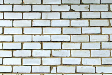 Background of white brick wall texture. Close-up view of cement bonded brick wall. Brick wall with different white colors stones. Outdoor and indoor interiors. Stone block seamless background