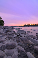 Manas river is located amidst the tiger reserve of Manas National Park in Assam, India. The sunset over the blue waters is really a treat for the eye.