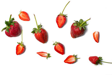 Strawberries with leaves isolated on a white background. Fresh red ripe berry waiting to be eaten.