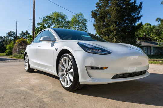 A brand new white Tesla Model 3