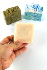 Handmade natural herbal soap Art on soap cubes on a white background