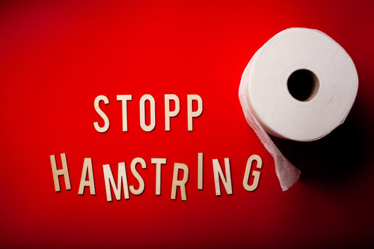 stopp hamstring norwegian word text wooden letter on red background coronavirus covid-19