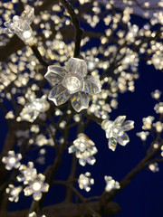 Close up view of lighting made with flower shapes.