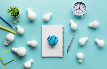 Business creativity concepts with group of lightbulb and paper crumpled on worktable.inspiration and motivation