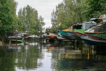 Fototapeta na wymiar Old vintage rustic boats in a harbour