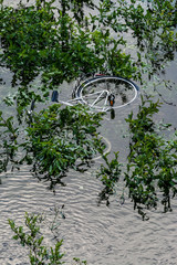 Bicycle thrown in a river