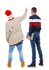 Back view two man in sweater with laptop.