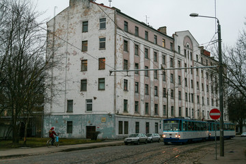 Riga, Latvia, 2009, December, Art Nouveau building with an old tramway and a cyclist