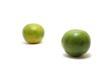 Two sweet oranges (Citrus sinensis) isolated on white background, perfect for breakfasting during ramadan