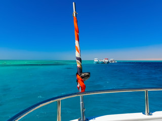 The sailboat in the Red Sea against the blue sky