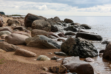 Big rocks on a sandy beach