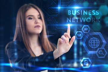 Business, Technology, Internet and network concept. Young businessman working on a virtual screen of the future and sees the inscription: Business network