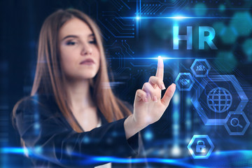 Business, Technology, Internet and network concept. Young businessman working on a virtual screen of the future and sees the inscription: HR